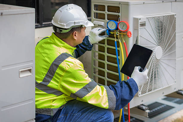 Professional Hvac technician working in Malone, FL